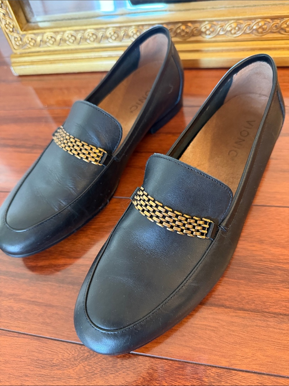 Bionics Charlotte Black Leather Loafers with Gold Chain Accent